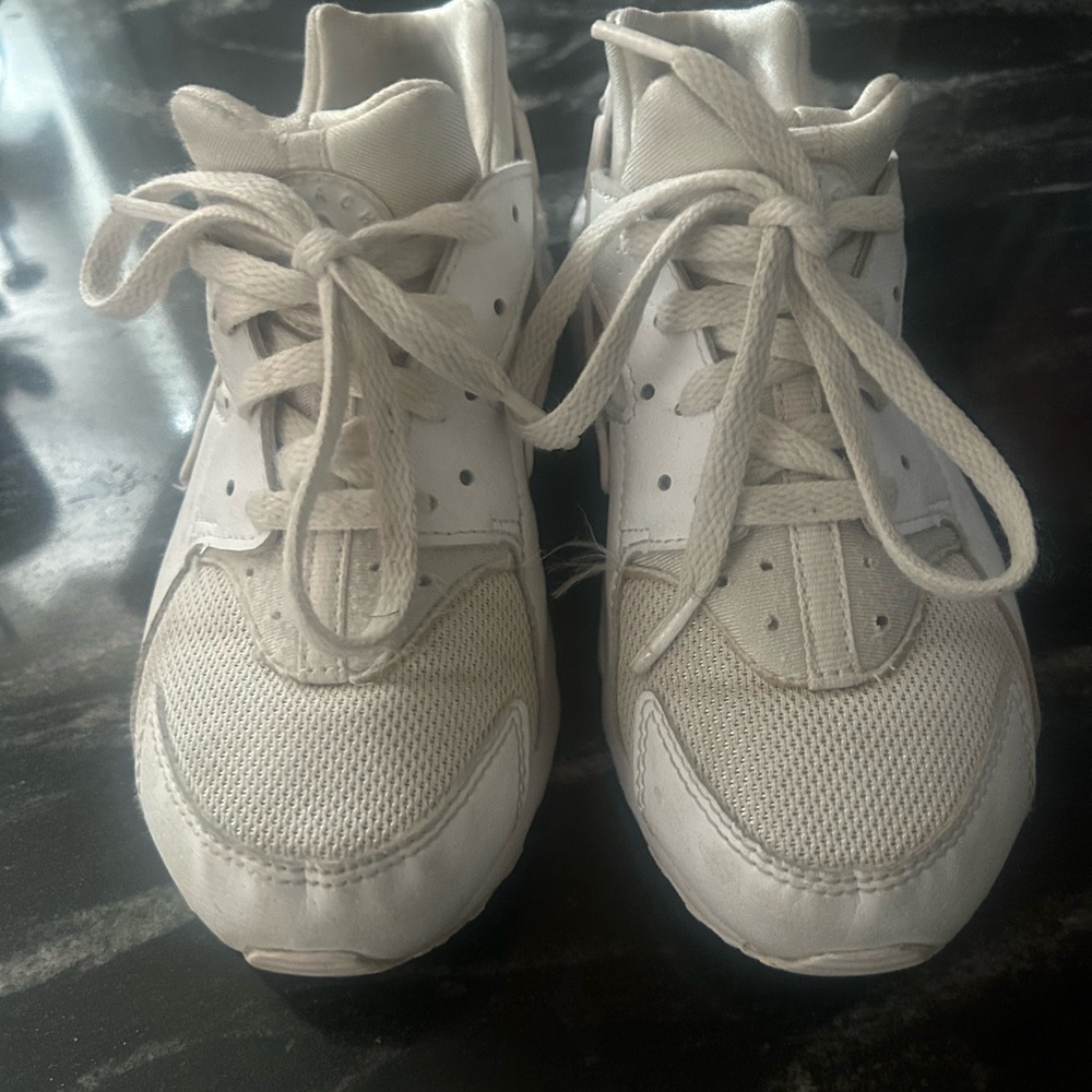 White Nike kids huarache sneakers